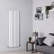 Milano Aruba White Vertical Designer Radiator 1600mm x 472mm in a grey sitting room with modern sofa SKU DRW0238