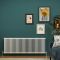 Milano Windsor white horizontal column radiator 600mm x 1595mm in a green sitting room with a blue sofa SKU TRUSHH311
