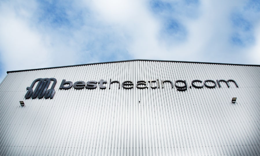 A padlock between mobile phones highlighting BestHeating’s commitment to safe transactions.