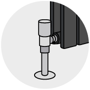 Angled radiator valve illustration with pipework from floor
