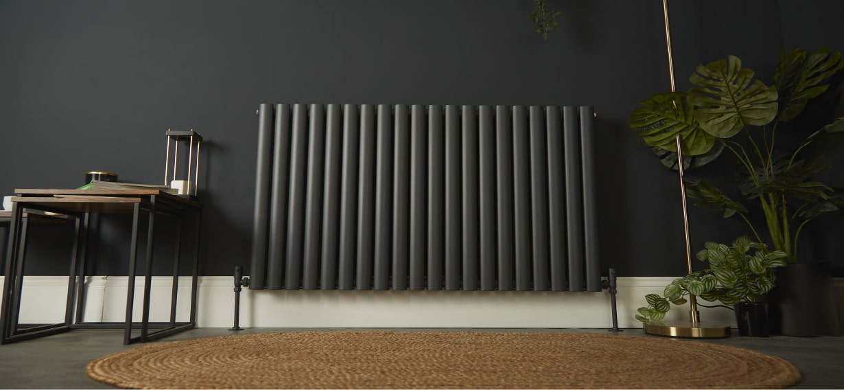 Anthracite horizontal double panel Milano Aruba designer radiator in a dark living area