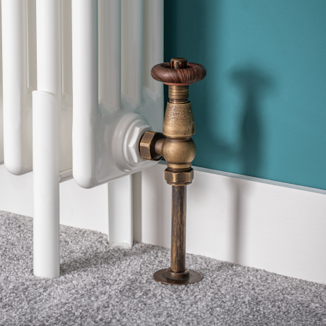 Traditional bronze radiator valve on a Milano Windsor column radiator 