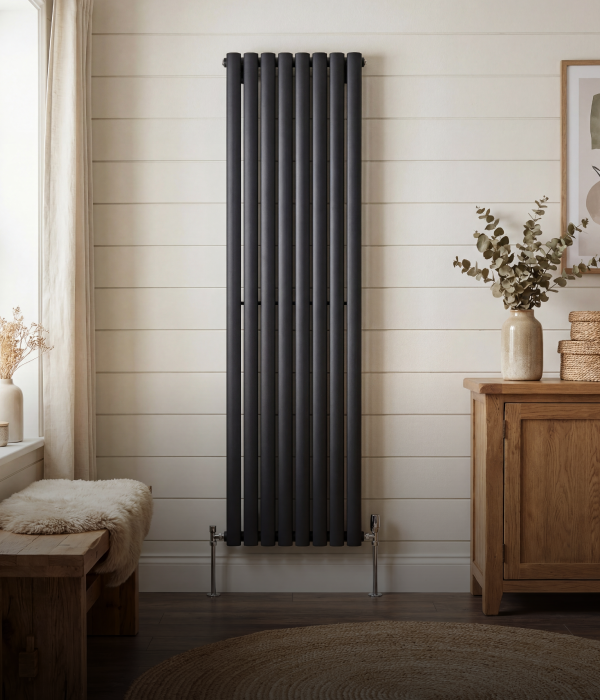 Tall vertical radiator fitted to a narrow wall space